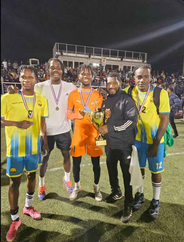 Champions with the Trophy